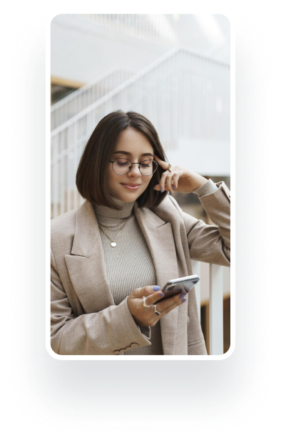 An image of a female participating in a mobile ethnography study by capturing experiences on her smartphone.